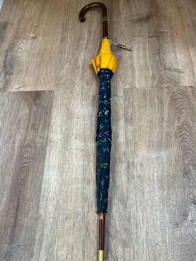 Vintage 70’s Givenchy umbrella New old stock.  Luxury brass fittings